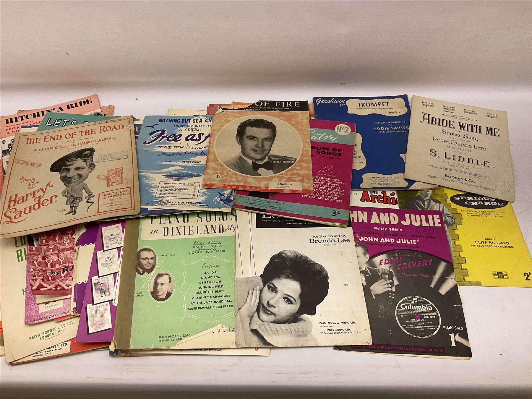 Collection of sheet music, many with attractive pictorial covers, to include The Rolling Stones It's All Over Now, Funny Girl, Living Doll Serious Charge Cliff Richard, Burbeck, Mary Poppins, Sugar, Sugar by The Archies, The Sound Of Music, I Taut I Taw A Puddy-Tat, Dear Miss Phoebe, etc, other musical sheet music and books etc