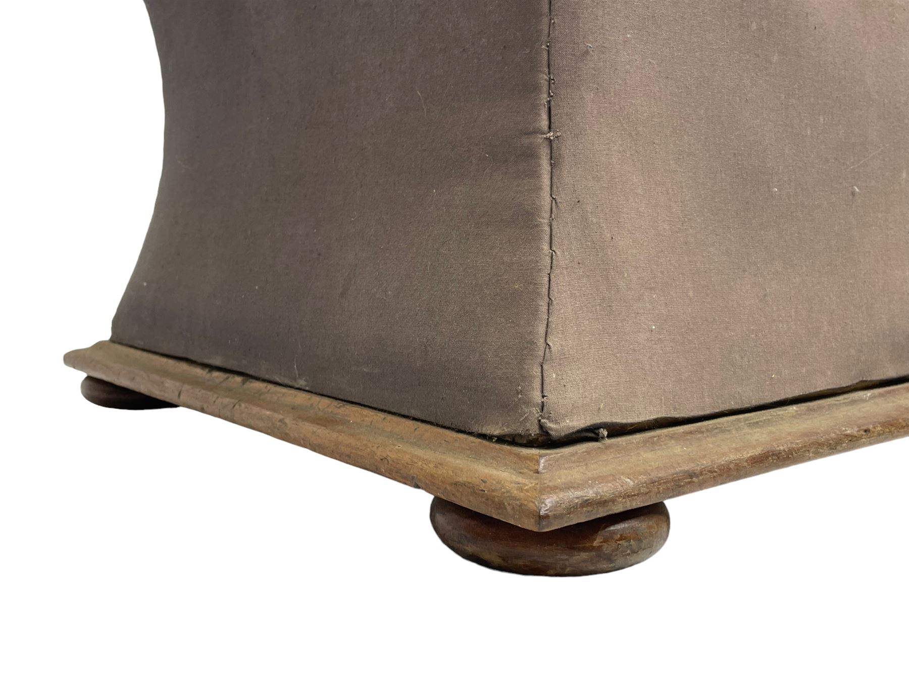 19th century upholstered ottoman, rectangular waisted form with hinged lid, upholstered in needle work cover decorated with floral panels and borders, the interior lined in blue fabric, lower moulded edge over compressed bun feet