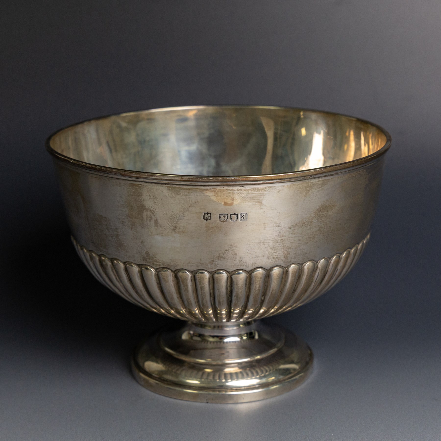Late Victorian silver rose bowl, of part fluted form, upon a circular domed foot, hallmarked Vale Brothers & Sermon, London 1896, H11.5cm, D16cm