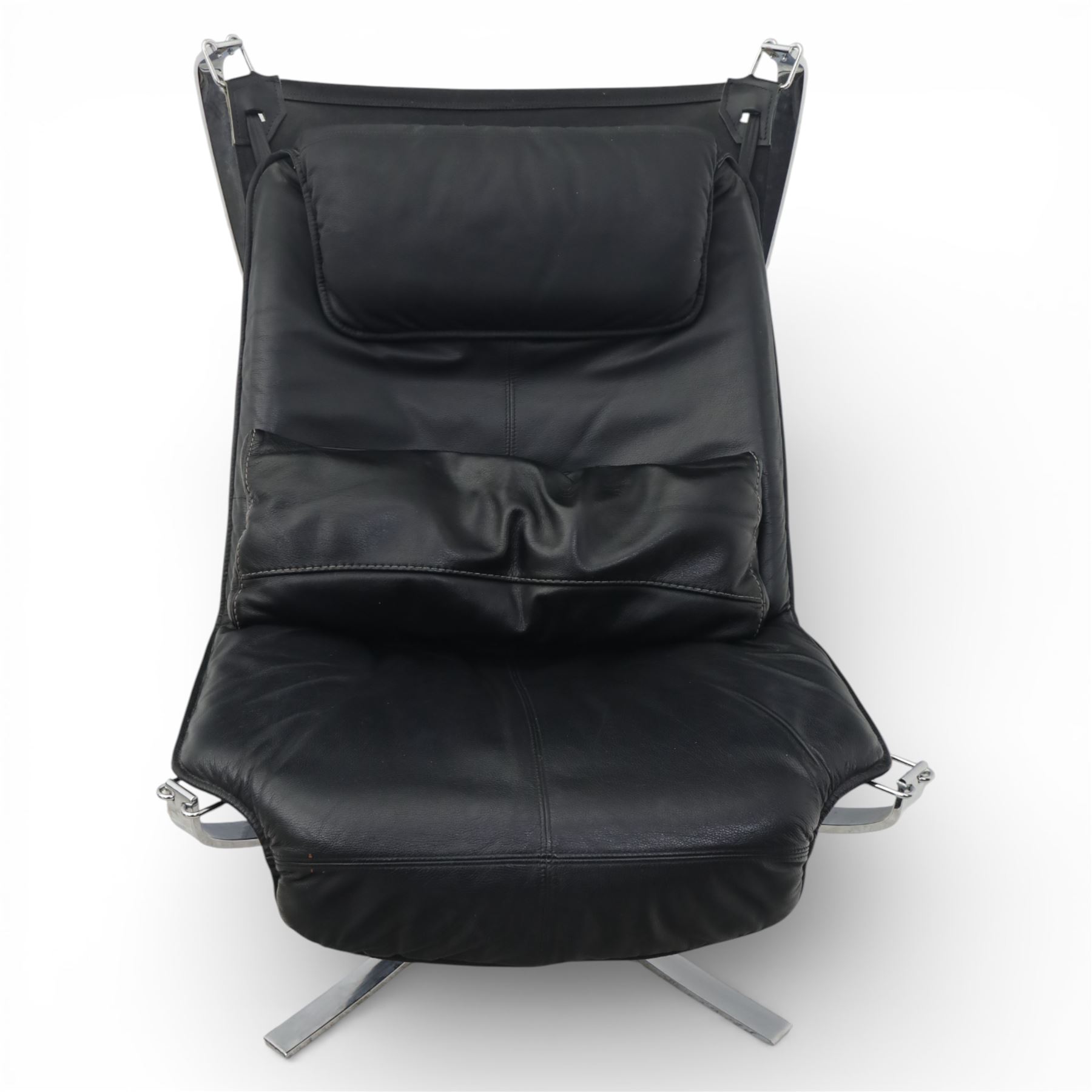 Pair of modernist black leather and chrome armchairs, in the manner of  Vatne Møbler, black leather sling seats suspended within chromed steel brackets, supported by polished chrome cross bases