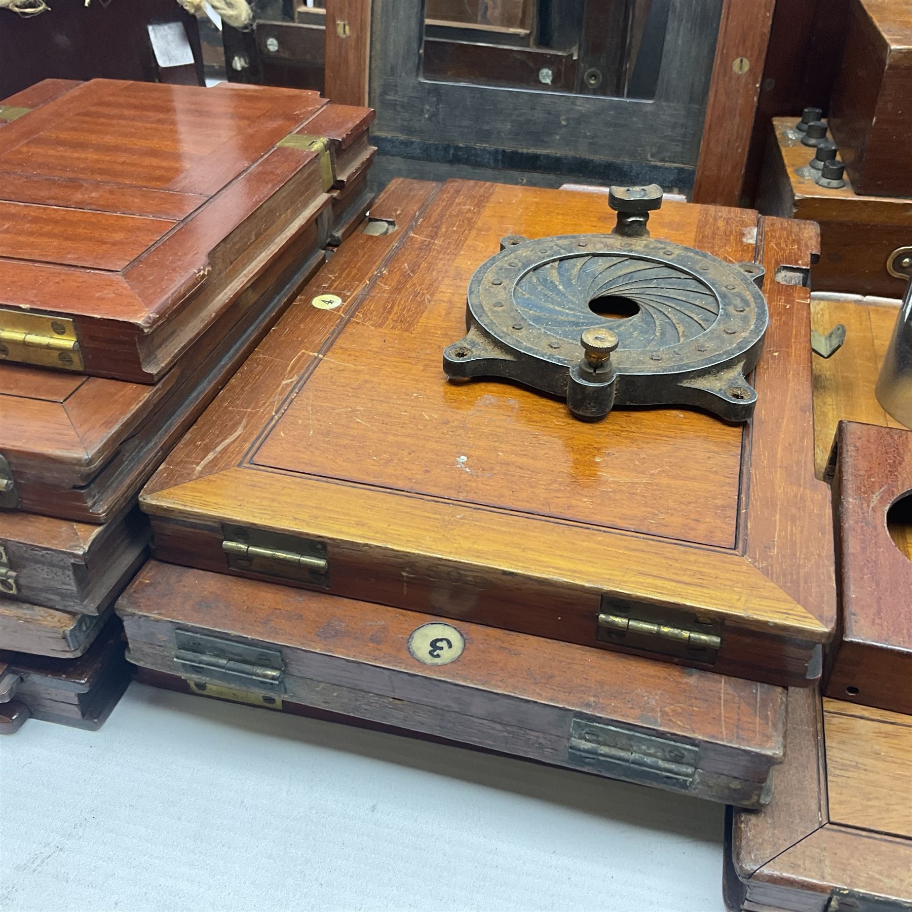 Collation of folding plate cameras of various sizes folding plate in mahogany and lacquered brass, together with camera plates and slides
By vendors repute some slide are from the Gandolfi workshop