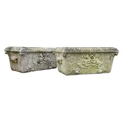 Pair composite stone planters, rectangular tapering form with stepped and gadrooned moulded rim, the body decorated with a floral and ribbon garland with acanthus leaf corners

Location: Duggleby Storage, Scarborough Business Park YO11 3TX