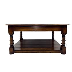 Oak coffee table, square moulded top on turned supports united by undertier 