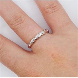 18ct white gold diamond full eternity ring, crossover set with twelve round brilliant cut diamonds, hallmarked