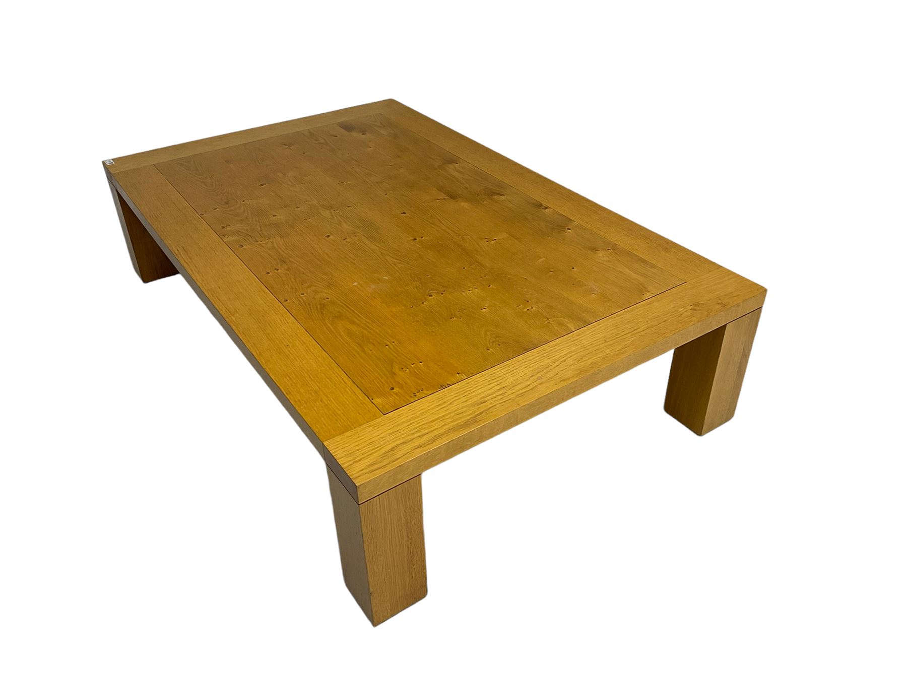 Large pippy oak rectangular coffee table, square block leg, retailed by Chapmans of Newcastle