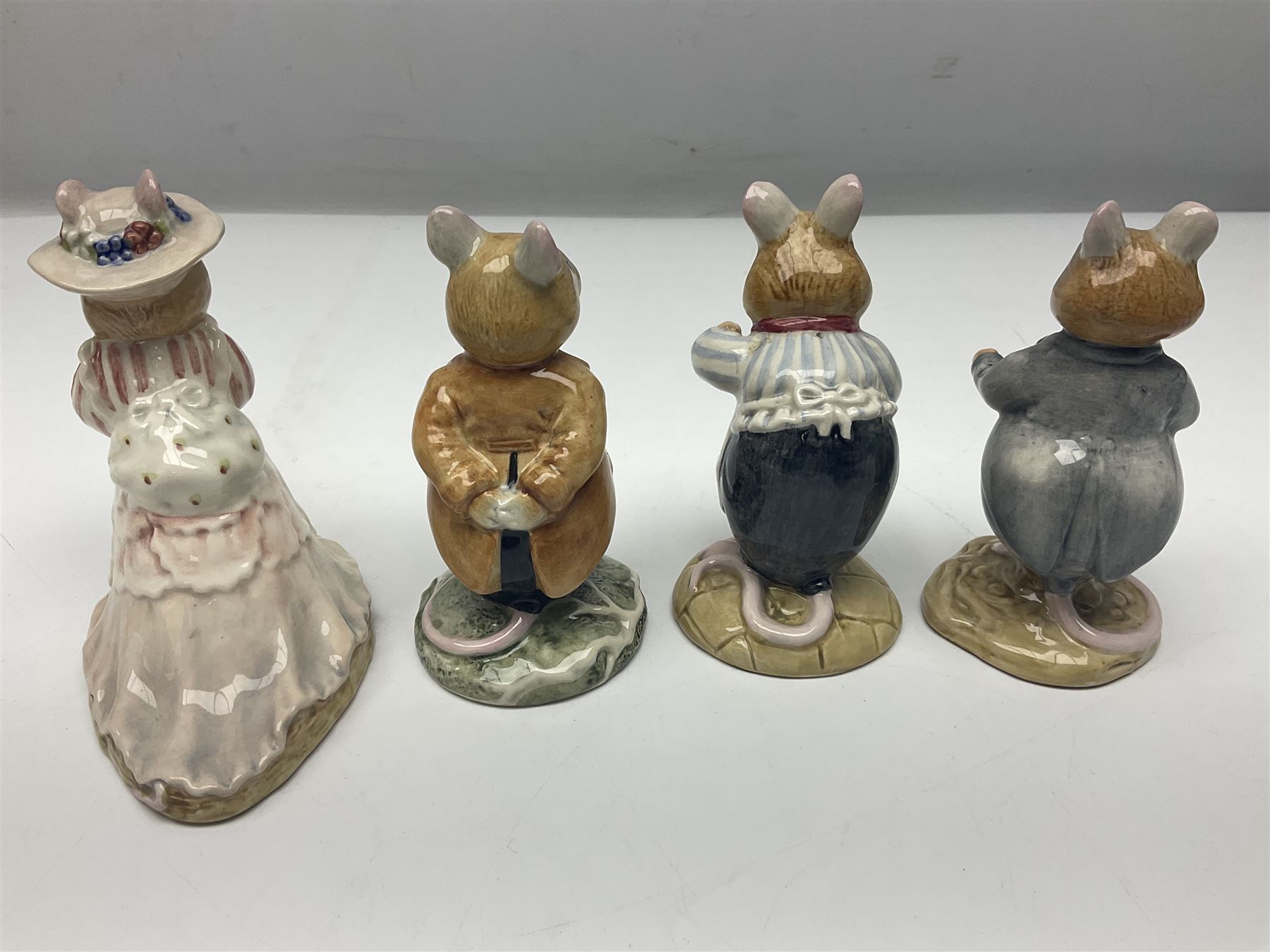 Five Royal Doulton Beatrix Potter figures, comprising Poppy Eyebright, Clover, Lord Woodmouse, Mr Apple and Dusty Dogwood, together with Beswick Appley Dapply figure and three Crummles Beatrix Potter enamel pill boxes