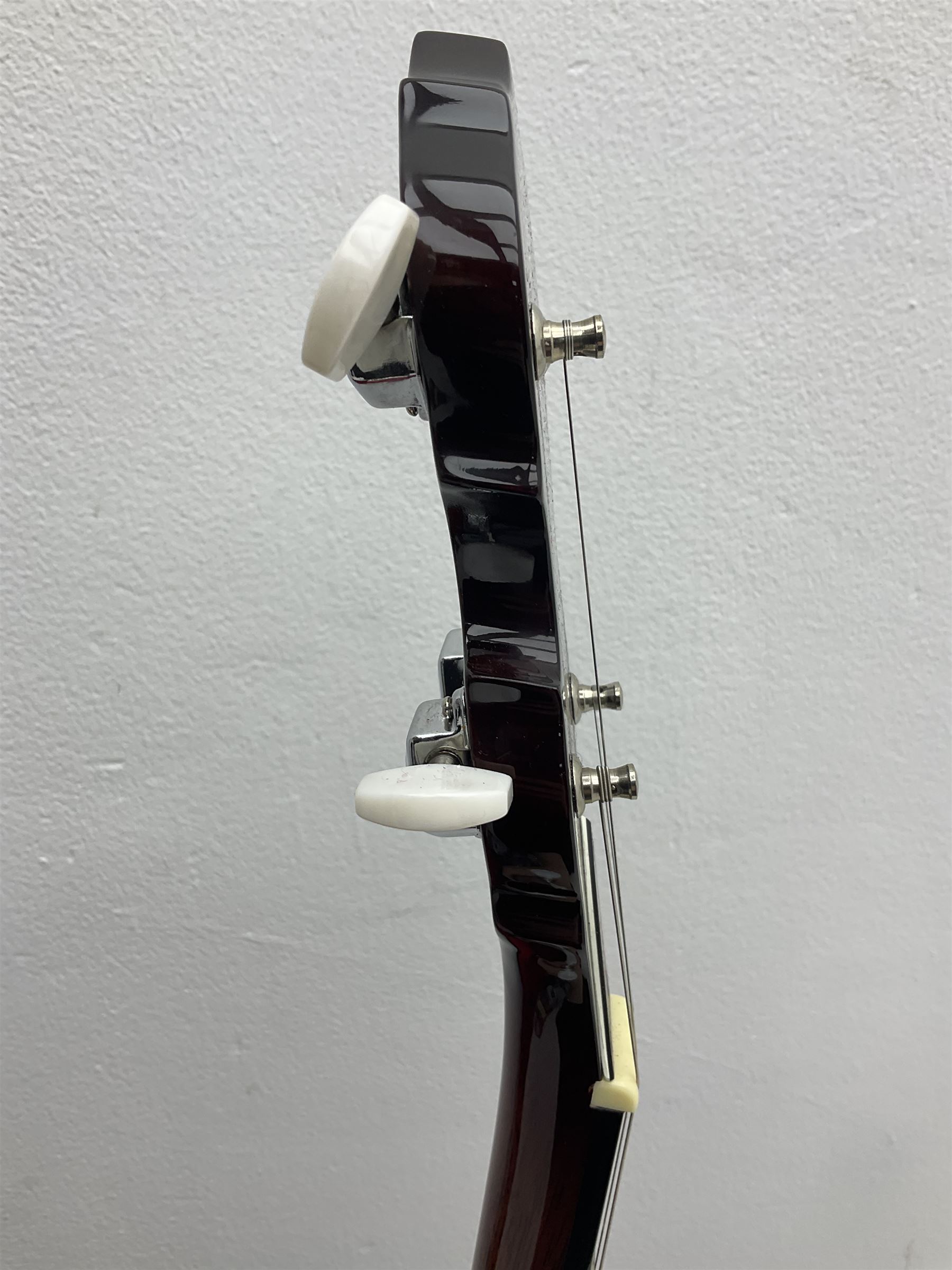 Rally five-string banjo with mahogany solid back L101cm in soft carrying case; and Brunswick Model BF200 acoustic guitar L103cm; with small quantity of instructional DVDs and booklets