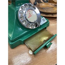 Jade green Bakelite telephone, of pyramid form with alphabet dial, brown braided handset cord and a base draw