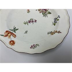 Mid 18th century Chelsea red anchor period plate, circa 1752-1758, of circular form hand painted with floral sprays and sprigs, the wavy edge with iron red rim line, with painted red anchor mark beneath, D21cm