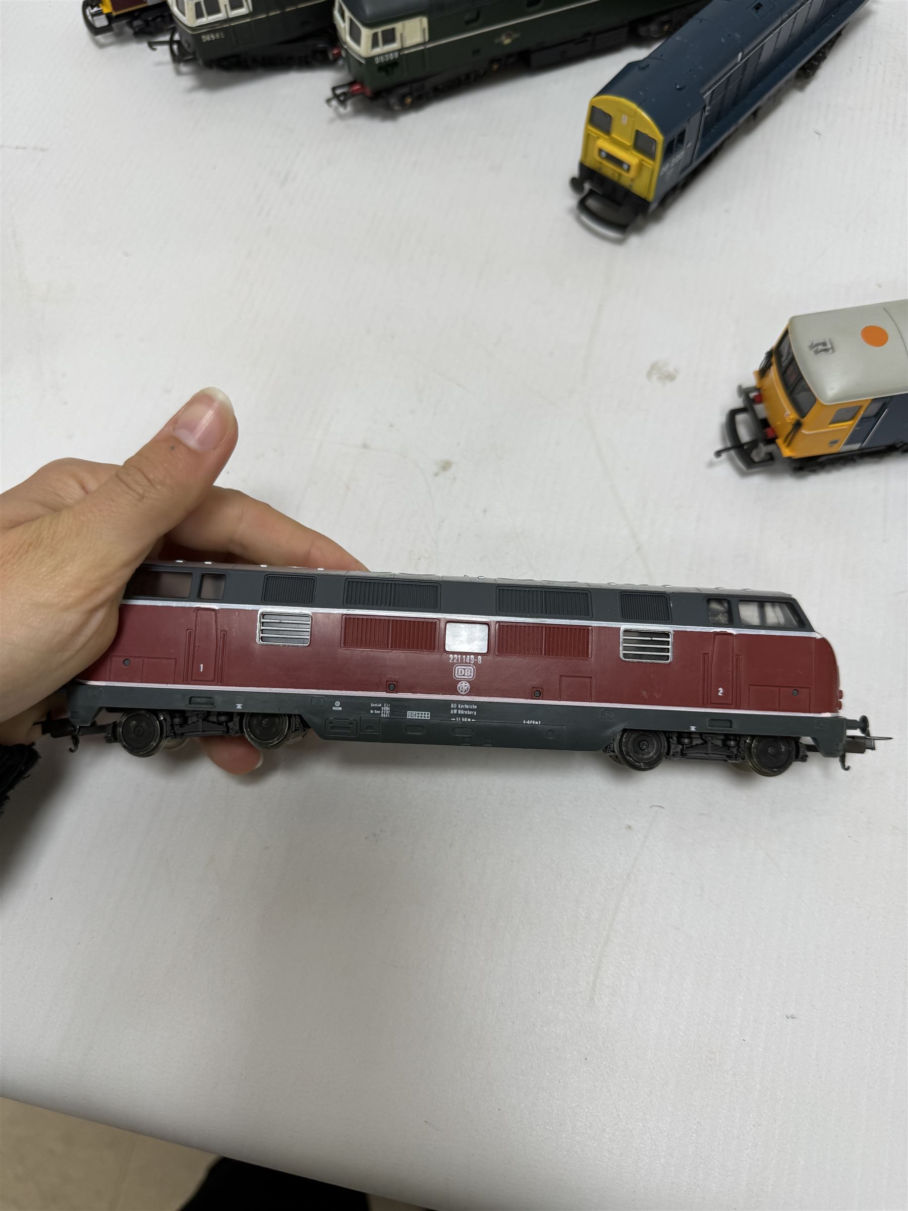 Eight Lima Ho and '00' gauge locomotives, comprising BR Class 20 locomotive no. 20222, re-worked BR Class 33 Bo-Bo locomotive no. D6585, Class 73 Bo-Bo Broadlands no. 73142, Class 73 Bo-Bo EWS locomotive no. 73128, 201640 Class BR no. 221 149-8 DB, Class 26 Bo-Bo locomotive no. D5308, Amtrak 523 diesel locomotive and Class 1400 2-4-0 no. 20215, unboxed