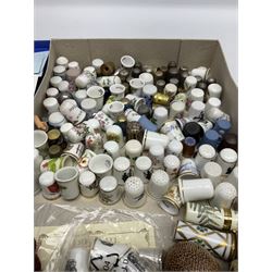 Large collection of thimbles, to include Wedgwood jasperware examples, Spode, cloisonné, together with tape measure in the for of a walnut, hedgehog thimble case etc