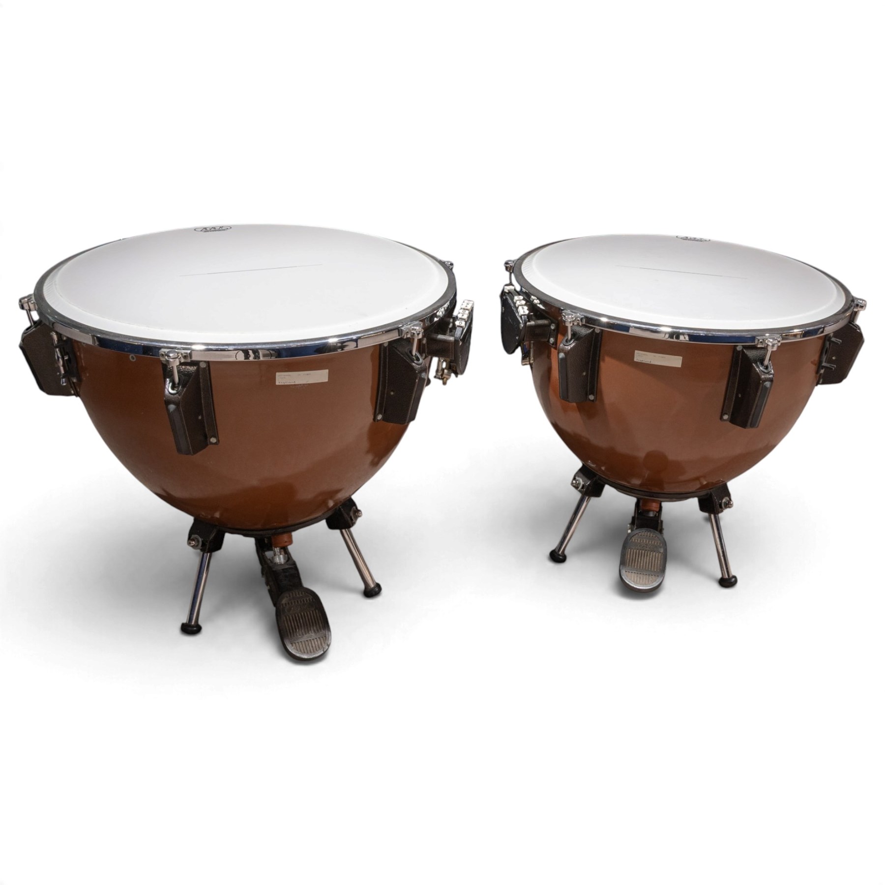 Pair of Adams Universal fibreglass pedal timpani, 29in and 26in, with Remo heads and tuning gauges, with mushroom covers