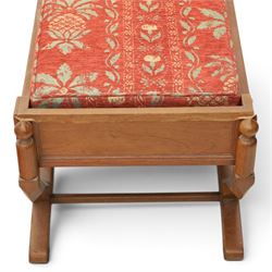 Traditional design teak long foot stool, red patterned seat cushion, on an X-frame base