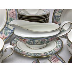 Royal Grafton tea and dinner wares decorated in the 'Sumatra' pattern, comprising twelve dinner plates, twelve lipped bowls, twelve smaller bowls, six teacups, six saucers and six plates, six coffee cups, six saucers and six plates, two milk jugs, two sucriers, sauce boat and saucer 