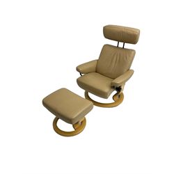 Ekornes Stressless - reclining armchair upholstered in latte leather, with footstool