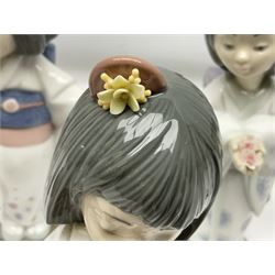 Six Lladro figures of the China doll set and Oriental doll set, comprising Playing the Flute no.6150, Bearing Flowers no.6151, Flower Gazer no. 6152, Oriental Dance no. 6230, Oriental Lantern no. 6231 and Oriental Beauty no. 6232, largest H20cm