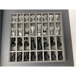 Swarovski silver crystal cut glass chess set, with clear and black pieces on mirrored board, in original presentation box 