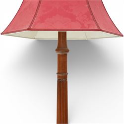 Hepplewhite design mahogany standard lamp, fluted column support with ring turned details, raised on a stepped square base with out-swept feet, fitted with a shaped red fabric lampshade