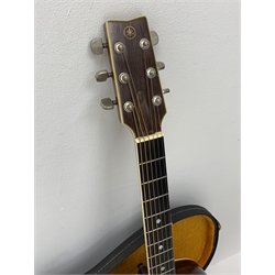Rare Yamaha FG-1200J acoustic guitar, spruce top, solid Jacaranda back and sides, ebony fret board, mother-of-pearl bound top, three-piece back with abalone trim, in carrying case