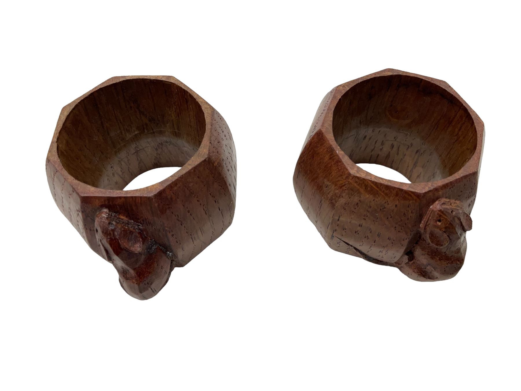 Mouseman - pair of oak napkin rings, of bulbous octagonal form each carved with mouse signature, by the workshop of Robert Thompson, Kilburn, L4cm W6cm