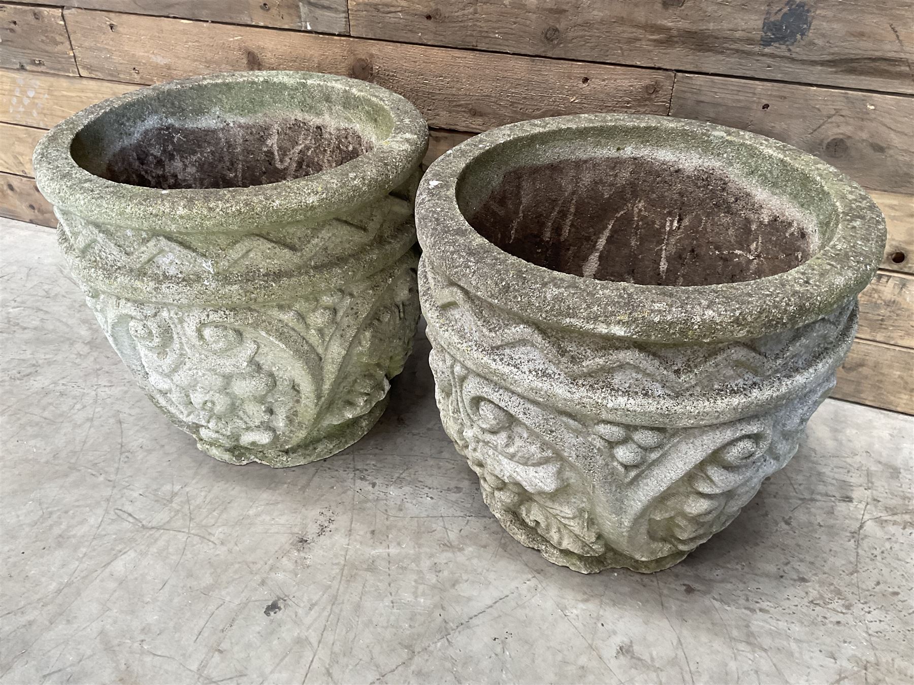 Pair of cast stone ornate circular planters