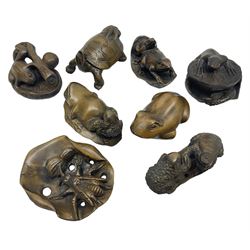 Eight netsuke, modelled as frogs, insects and a tortoise