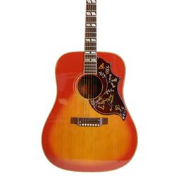 1968 Gibson Hummingbird acoustic guitar, with sunburst finish, serial no. 500460, inlaid mother of pearl fret markers, inlaid pick guard, bound fingerboard and sides, original adjustable bridge, original tuning pegs, contained within hard case, guitar length 104cm