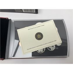 Queen Elizabeth II The Royal Canadian Mint 2006 silver proof dollar and two 2006 proof sets of Canadian coinage, all cased with certificates 