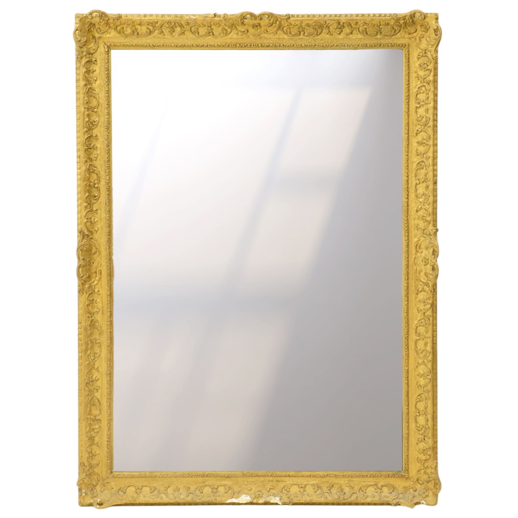 Large Louis XV style gilt framed mirror, the rectangular plate within a pierced and moulded surround decorated with foliate scrolls and flowerheads