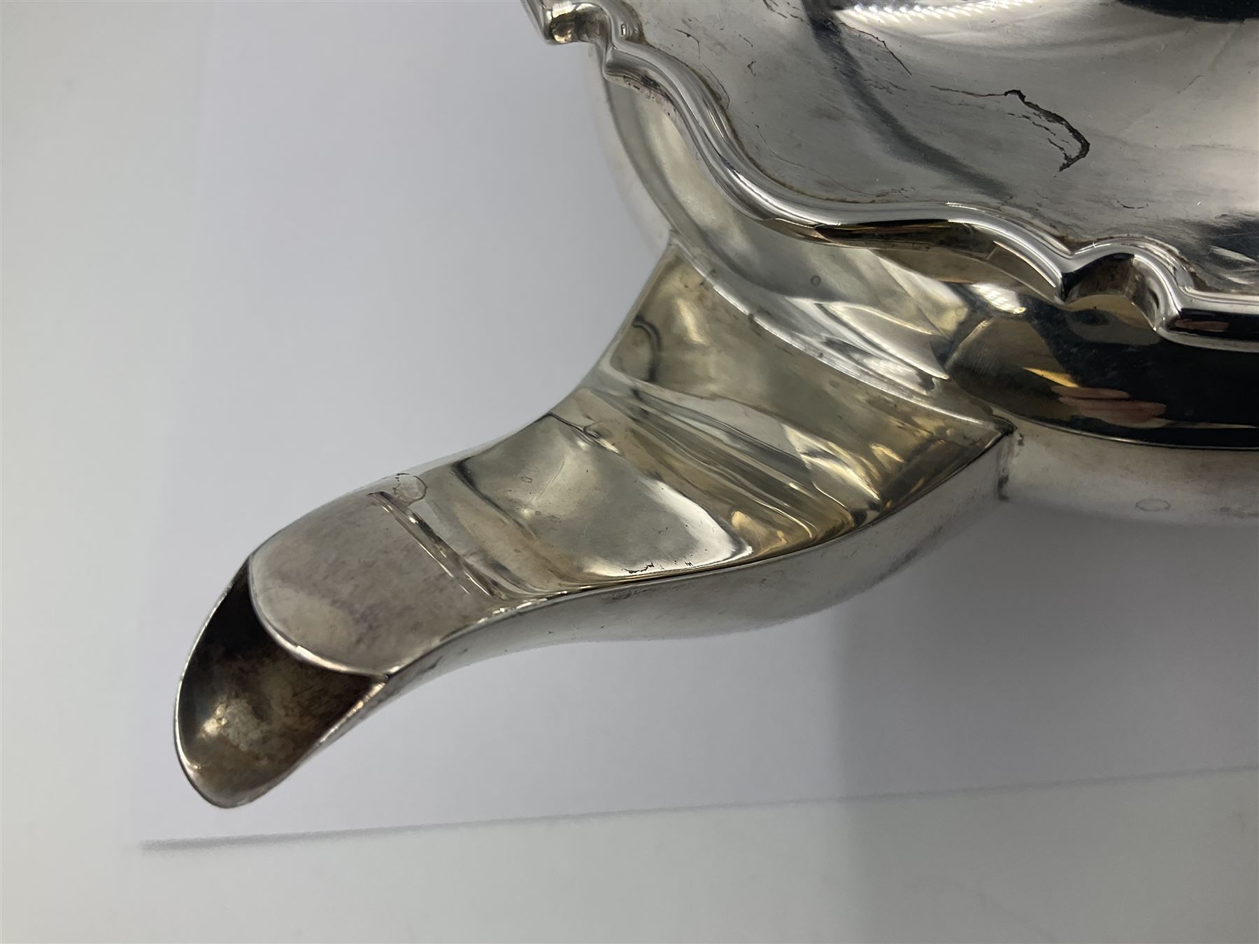 1920s five-piece silver tea service, comprising teapot, coffee pot, hot water pot, twin handled open sucrier and milk jug, each of squat circular form with shaped rim, the teapot, coffee pot and hot water pot each with ebonised handle and finial, the sucrier and milk jug with acanthus capped scroll handles, all upon circular foot, hallmarked R F Mosley & Co, Sheffield 1926 & 1927, tallest H24cm