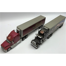 Two Franklin Mint 1:32 scale die-cast models of American Trucks comprising Peterbilt Model 379 truck and trailer and Mack truck and trailer, in four boxes