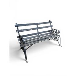 Coalbrookdale - rare pair of wrought iron and slatted wood garden benches, the twin wrought iron strapwork bench-ends formed of four scrolls over splayed feet, number 77 in the Coalbrookdale Castings Catalogue (see illustration)