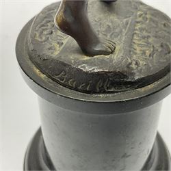 Bronze figure modelled as a nude woman with one arm raised a crescent moon upon her forehead, raised upon a circular stepped plinth, H36cm