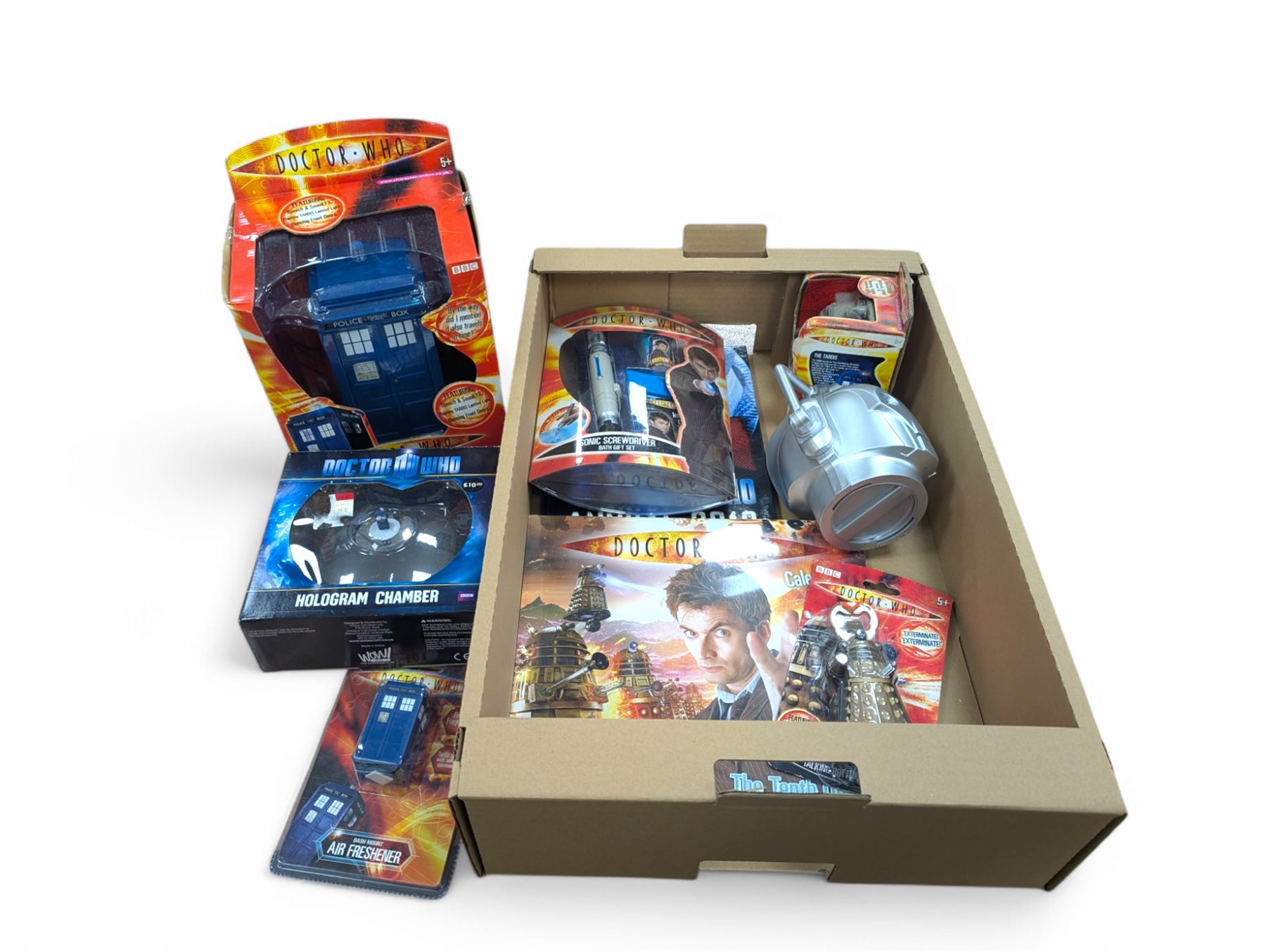 Doctor Who collectables, including Tardis Money Bank, Hologram Chamber, Bottle Opener, Cyber Man money box, calendar, annual, etc
