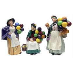 Three Royal Doulton figures, comprising Balloon Lady HN293, The Old Balloon Seller HN1315 and Biddy Penny Farthing HN1843, all with printed marks beneath