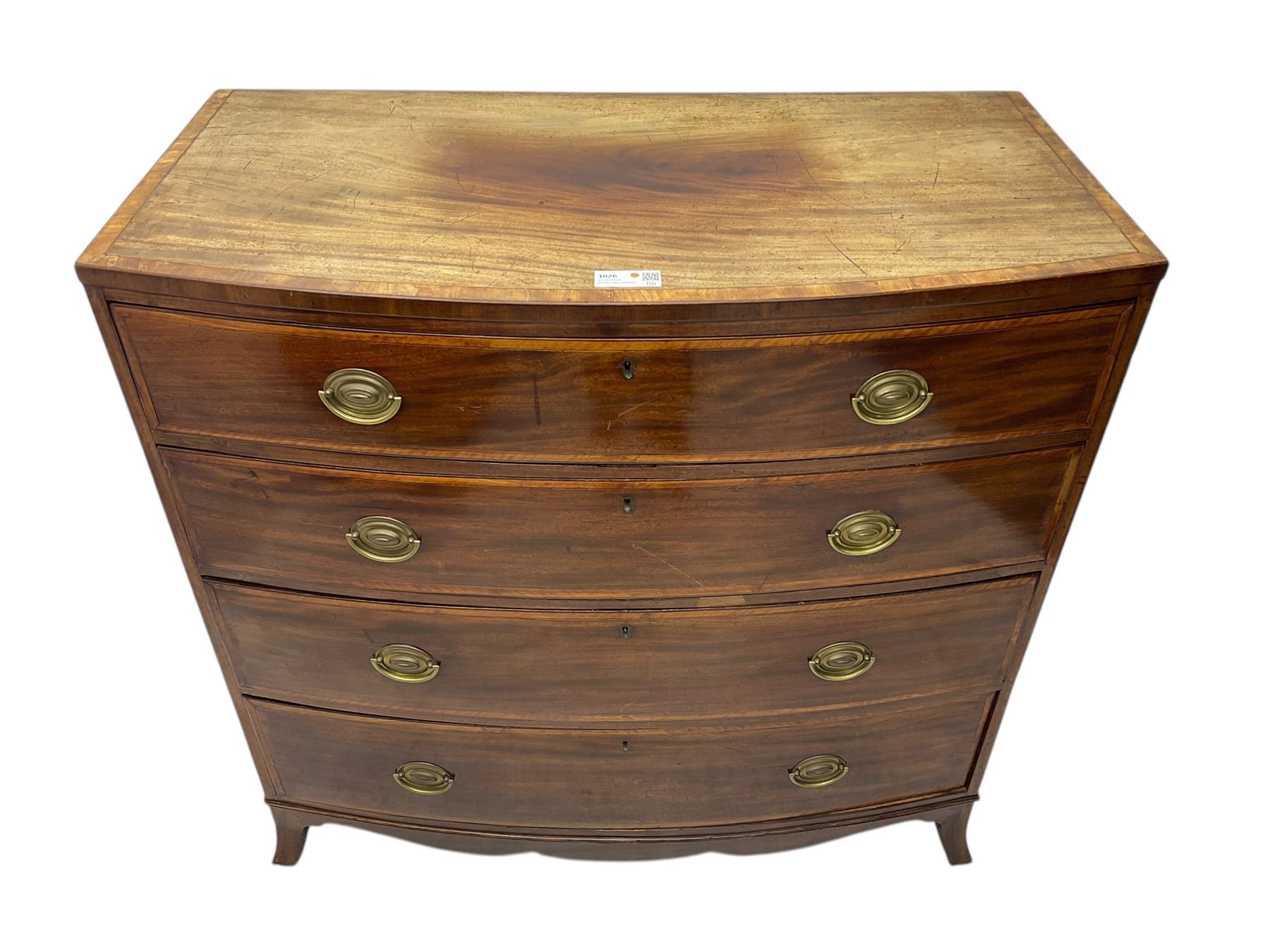 George III mahogany bow-front chest of drawers, four graduated drawers with oval brass handles, raised on splayed bracket feet with a shaped apron