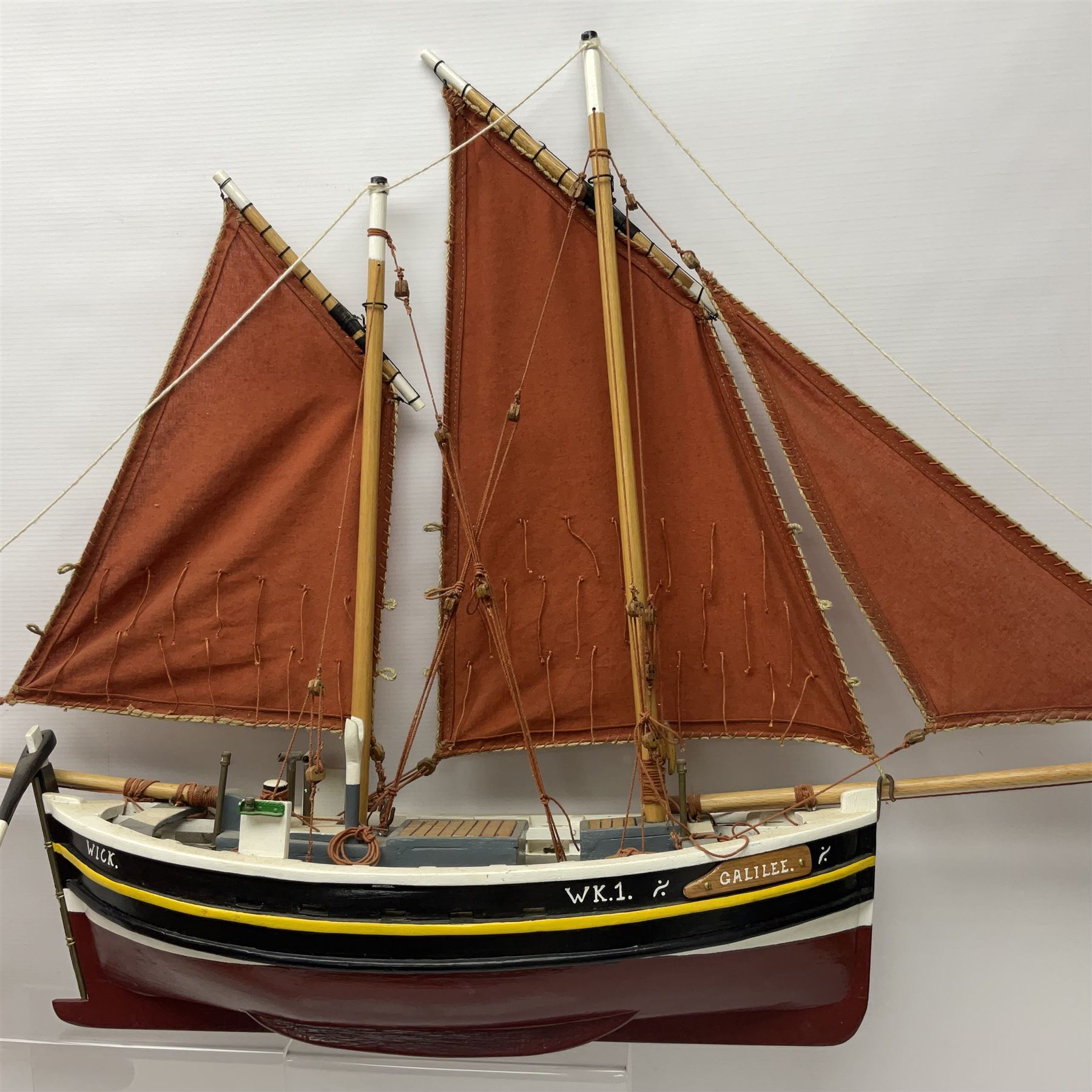 Wooden model of the Peterhead Herring Fishing Boat, Love Divine, PD404. on stand together with Wick Herring Fishing Boat, Galilee WK.1. on stand, L105cm, H64cm