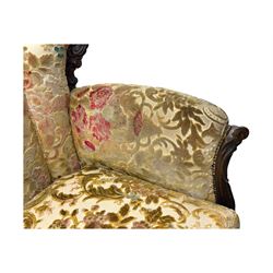 Victorian design stained wood three seater settee, top rail carved and scrolled, padded back and arms, scrolled cabriole feet 