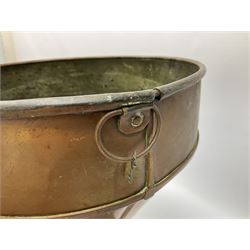 Agricultural copper corn funnel, H32.5cm, another similar copper funnel and copper warming platter of oval form, with twin handles on four supports, with removeable warming plate, L49cm