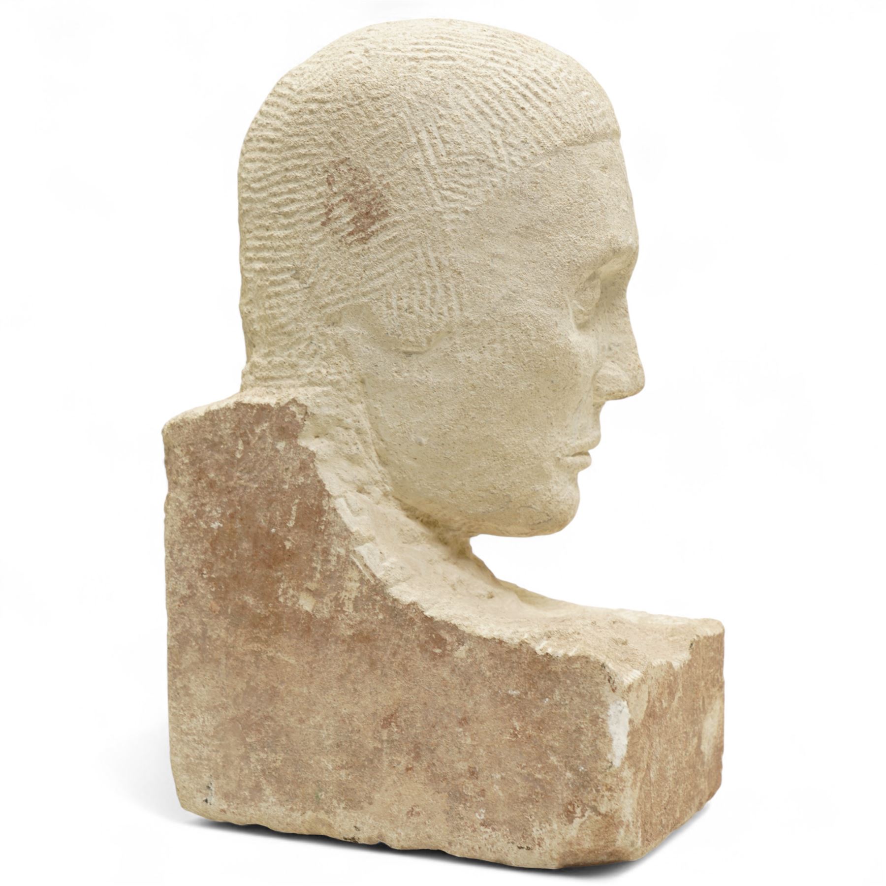 Modern carved limestone slab sculpture of the head of a man, H38cm 