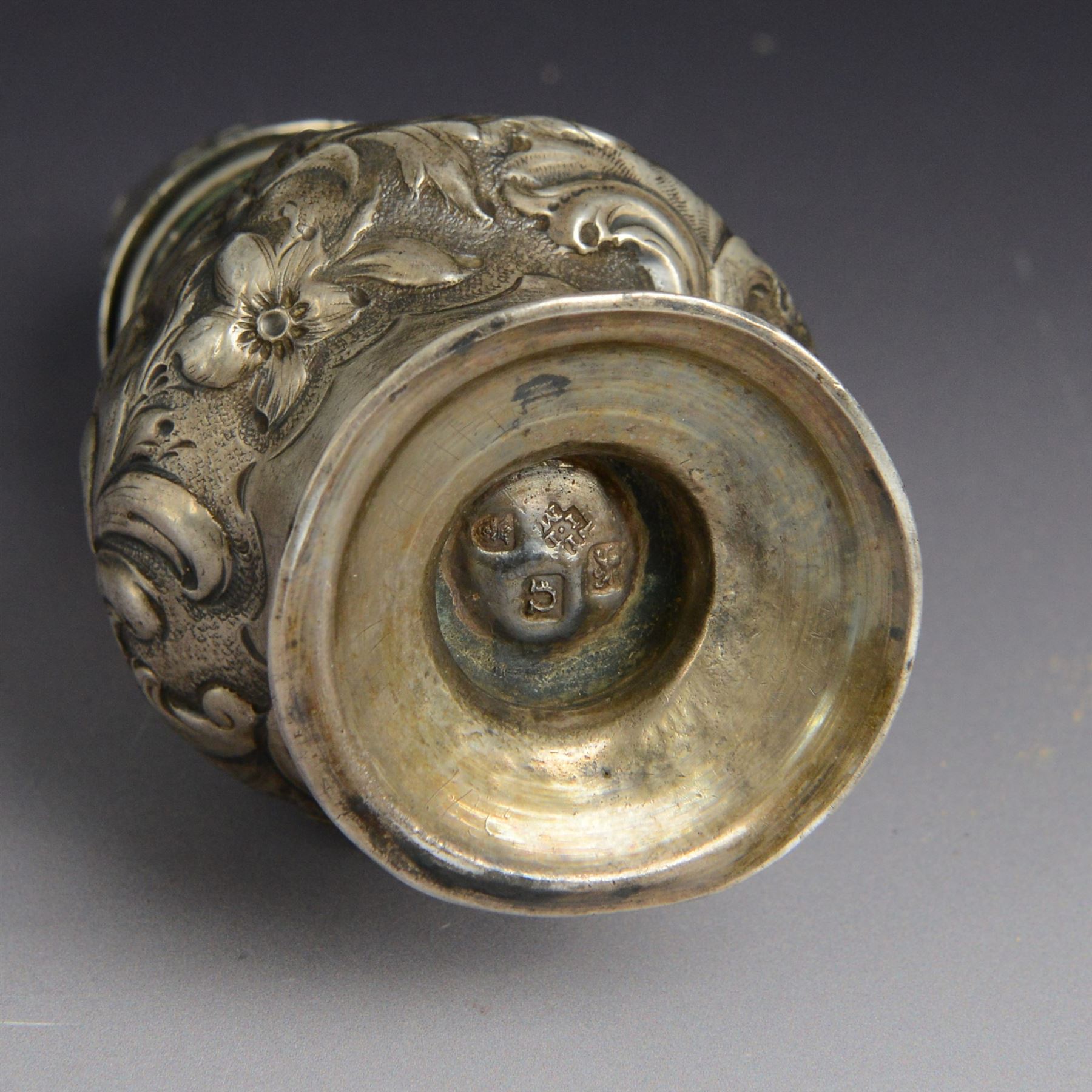 George III silver sugar caster, of typical form profusely embossed with floral and foliate details, hallmarked Jabez Daniell & James Mince, London 1768, H15cm