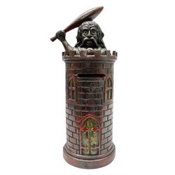 Late 19th century cast-iron mechanical money bank 'Giant in Tower' by John Harper & Co; reg.no.196844, patented 13th August 1892 H23cm