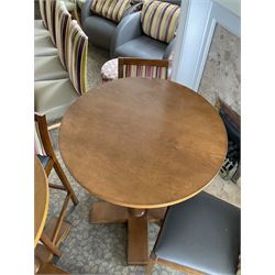 Two circular walnut finish high bar stools, and four stools with charcoal leather seats- LOT SUBJECT TO VAT ON THE HAMMER PRICE - To be collected by appointment from The Ambassador Hotel, 36-38 Esplanade, Scarborough YO11 2AY. ALL GOODS MUST BE REMOVED BY WEDNESDAY 15TH JUNE.