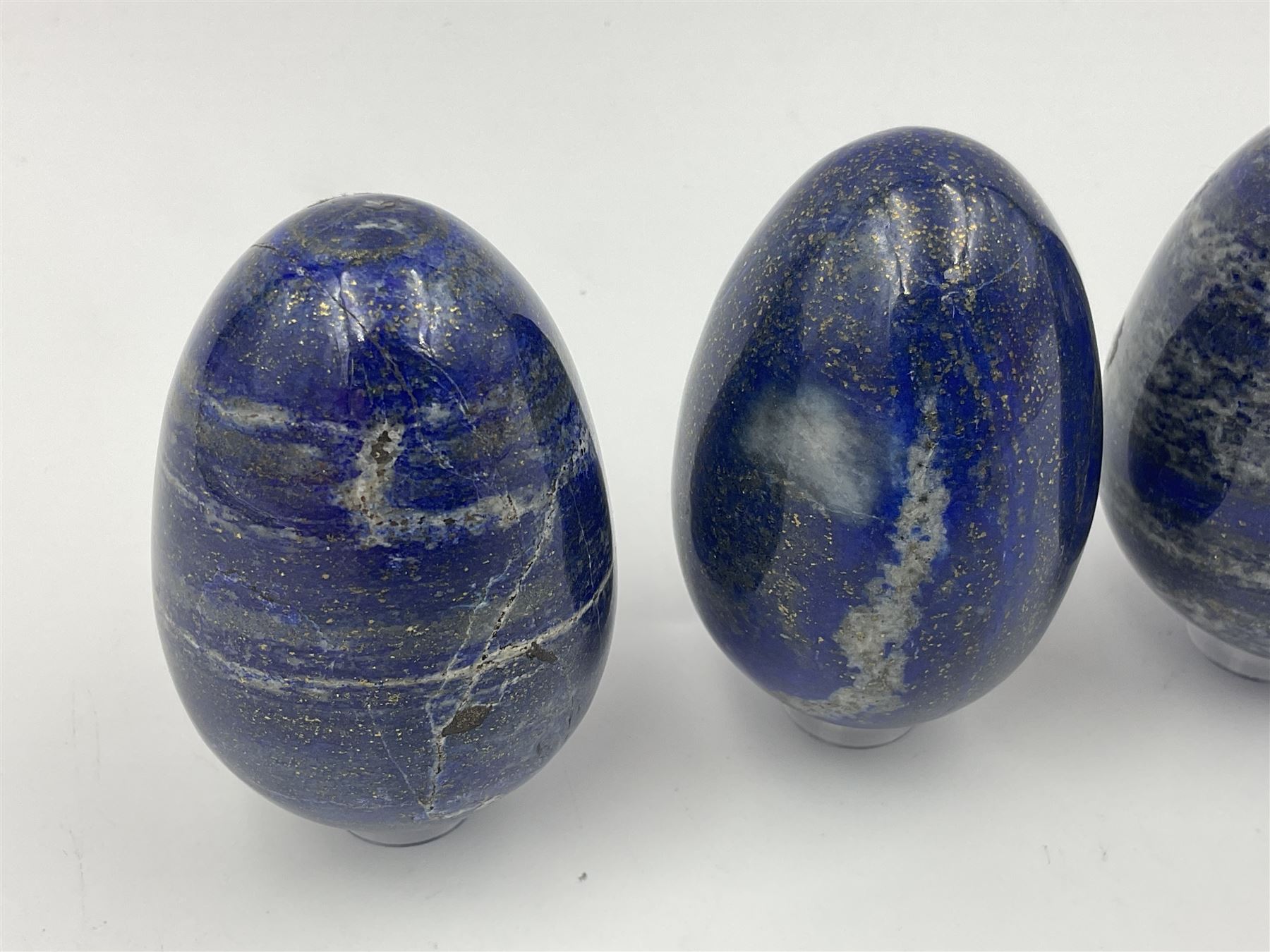 Collection of five Lapis lazuli specimen eggs, largest egg H7cm
