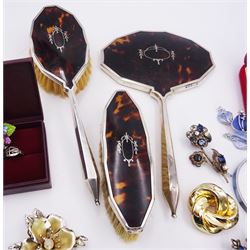 1920's silver mounted faux tortoiseshell dressing table set comprising of hairbrush, clothes brush and hand held mirror, hallmarked Daniel Manufacturing Company, Birmingham 1929, two silver rings and a collection of costume jewellery including twenty three brooches, two pendant and earring sets, etc
