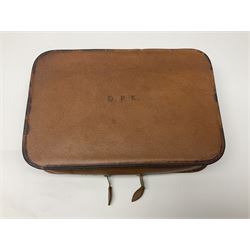 Mappin & Webb leather cased campaign gentleman's vanity set, the tan leather case opening to reveal fitted interior with five engine turned silver capped glass vanity bottles, hallmarked Mappin & Webb, London 1944, brushes, mirror etc, monogram DPK to the top of the case