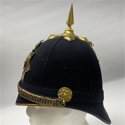 Late Victorian North Staffordshire Regiment Officer's Home Service Blue Cloth Helmet, having incorrect other ranks gilt metal Queen's crown helmet plate to the front with later leather backing, removable spike to the top on a shaped cruciform base with rosette fittings, rosette side bosses, brass trim to the front peak, and leather and velvet backed chin scales, with leather sweat band, the interior with makers stamp for Hawkes & Co 14 Piccadilly London