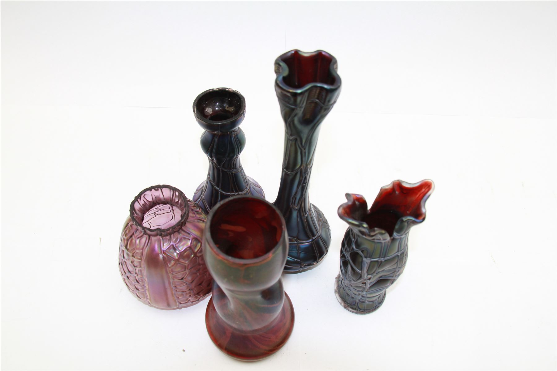 Five Austrian Art Nouveau glass vases, to include Pallme-Konig example with split fluted rim, two similar Kralik examples with threaded vein decoration and two others, tallest H21.5cm