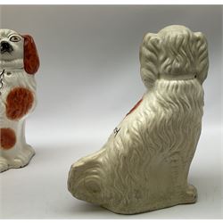 Pair of Victorian Staffordshire spaniels, H29cm