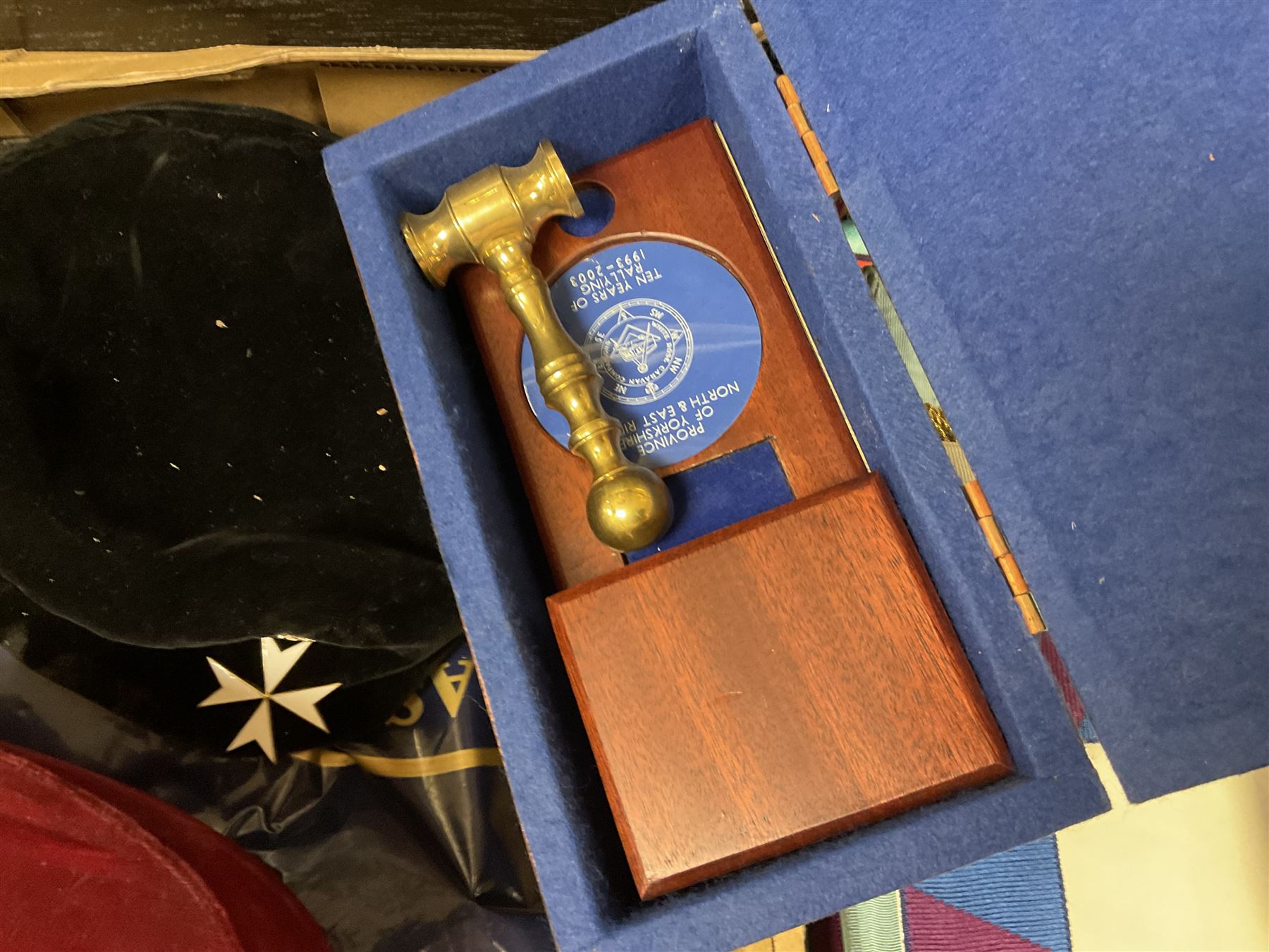 Masonic regalia, including sword, kid leather gloves and apron, Order of Holy Wisdom high priest mitre, etc, contained within briefcases and boxes 